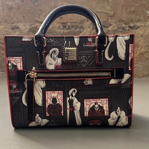 Dooney & Bourke Black and Red Satchel with Artistic Design